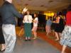 Conference participants kicking up their heels - literally - to Tim Chaisson and Tian Wigmore's live music at Saturday's banquet